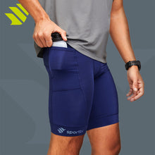 Bermuda de compressão masculina azul marinho - Sportbr, 6 bolsos, elasticidade e ajuste ao corpo. Compressão média para melhorar a circulação sanguínea e reduzir a fadiga muscular. Com proteção UV 50+, reduz a exposição da pele ao sol em até 20%. Design com costuras leves e localizadas para evitar atrito com a pele. Use sem a parte intima.