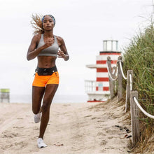 Mulher correndo com a Pochete Neo Racing fitletic sportbr.