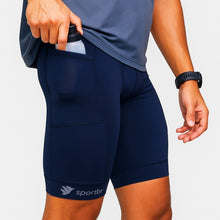 Bermuda de compressão masculina azul marinho SPORTBR com 6 bolsos para corrida e treino, feita de poliamida e elastano.