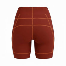 Bermuda de compressão feminina SPORTBR terra cota com 6 bolsos, cós alto e costura contrastante. Ideal para corrida.