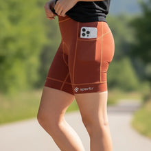 Bermuda de compressão feminina SPORTBR terra cota com 6 bolsos, ideal para corrida e treino.