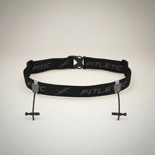 Cinto de corrida preto Fitletic Race I com porta número e detalhes refletivos. Ajustável e leve para provas.