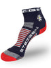 Meia Steigen cano baixo azul marinho com detalhes em vermelho e branco, ideal para corrida.