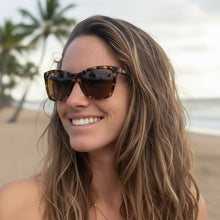 Óculos de sol SPORTBR Vanguard Visionary marrom com armação tartaruga e lentes polarizadas, ideais para corrida.