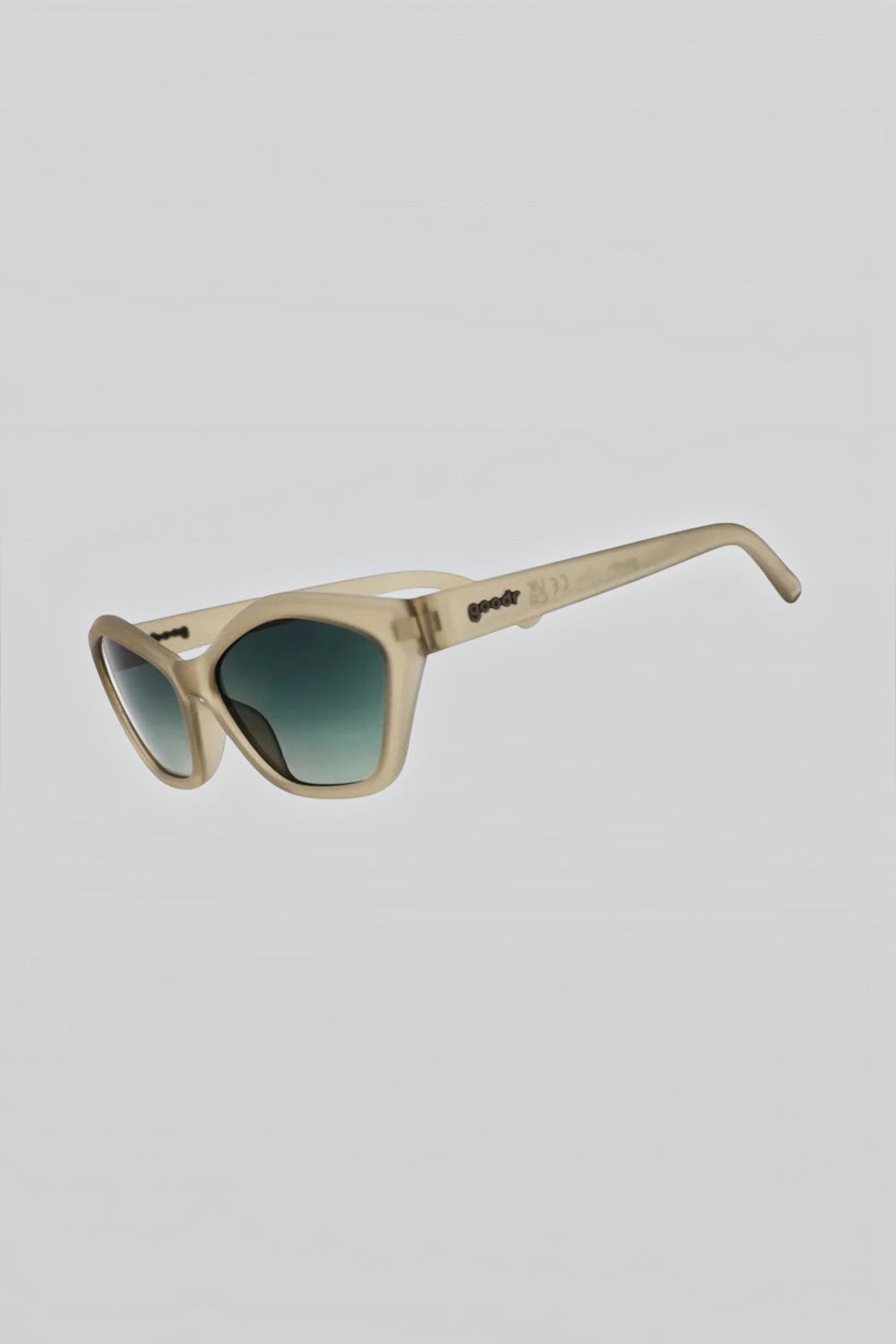 Óculos de sol SPORTBR Goodr Dulce De Leche Luxe com armação cinza translúcida e lentes verdes degradê polarizadas.