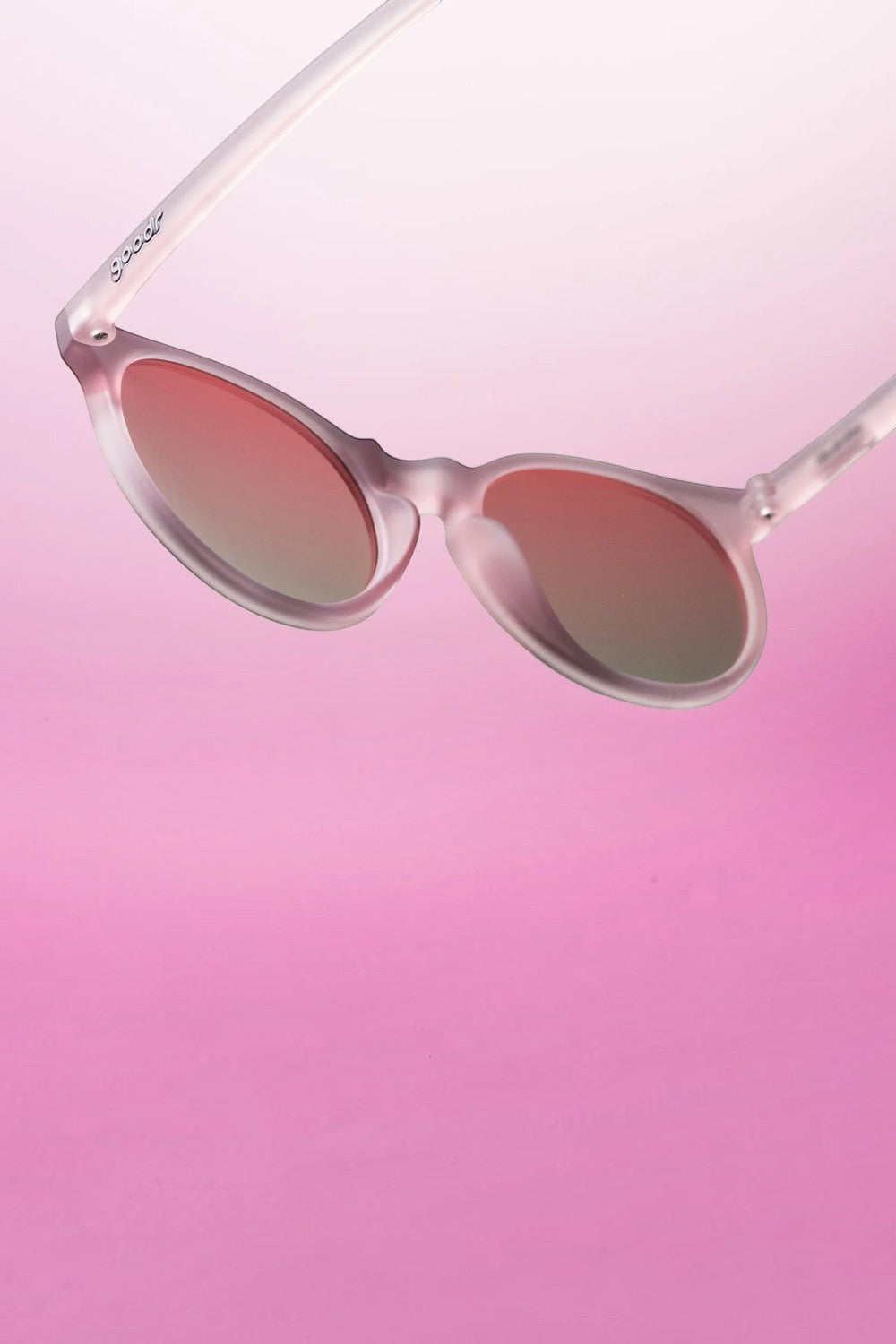 Óculos de sol SPORTBR Goodr Mauve Mood Board com armação lilás translúcida e lentes rosas polarizadas para corrida.
