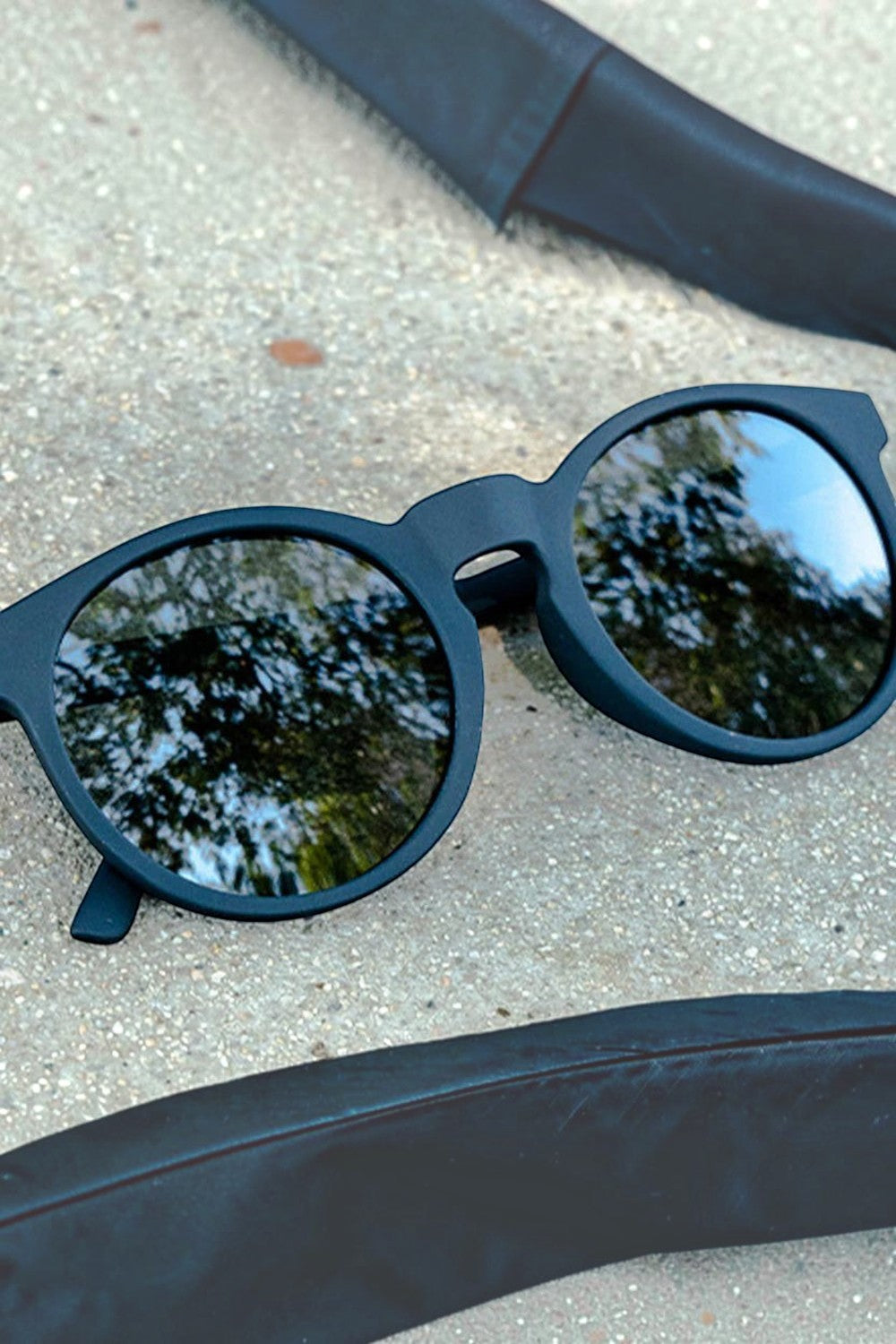 Óculos de sol SPORTBR Goodr Circle G pretos com lentes polarizadas, ideais para corrida e atividades ao ar livre.