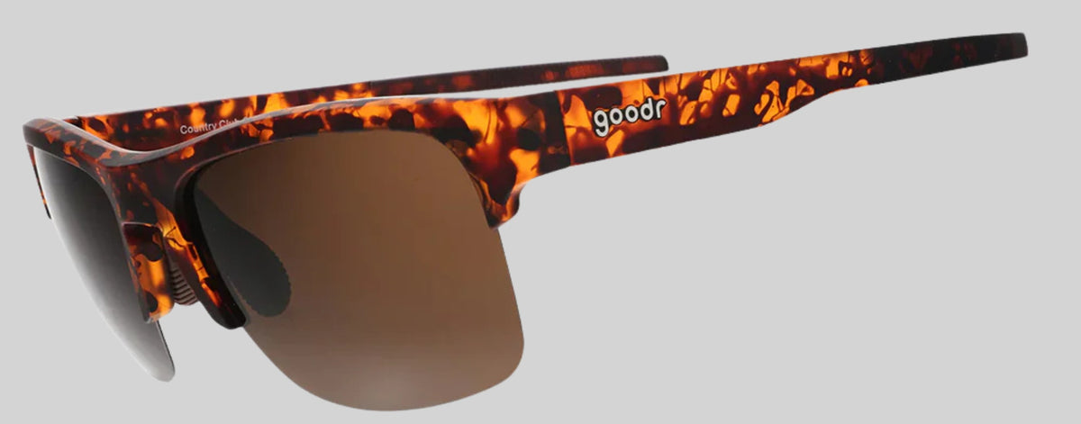 Óculos de sol SPORTBR Goodr Country Club Crasher com armação marrom tartaruga e lentes polarizadas marrons.