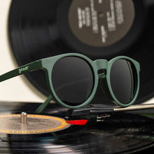 Óculos de sol Goodr CIRCLE G verdes, com lentes polarizadas e proteção UVA UVB, ideais para corrida.