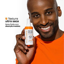 SPORTBR Protetor Solar Corporal e Facial Bifásico FPS 57 Pink Cheeks spray toque seco, com embalagem laranja e branca.