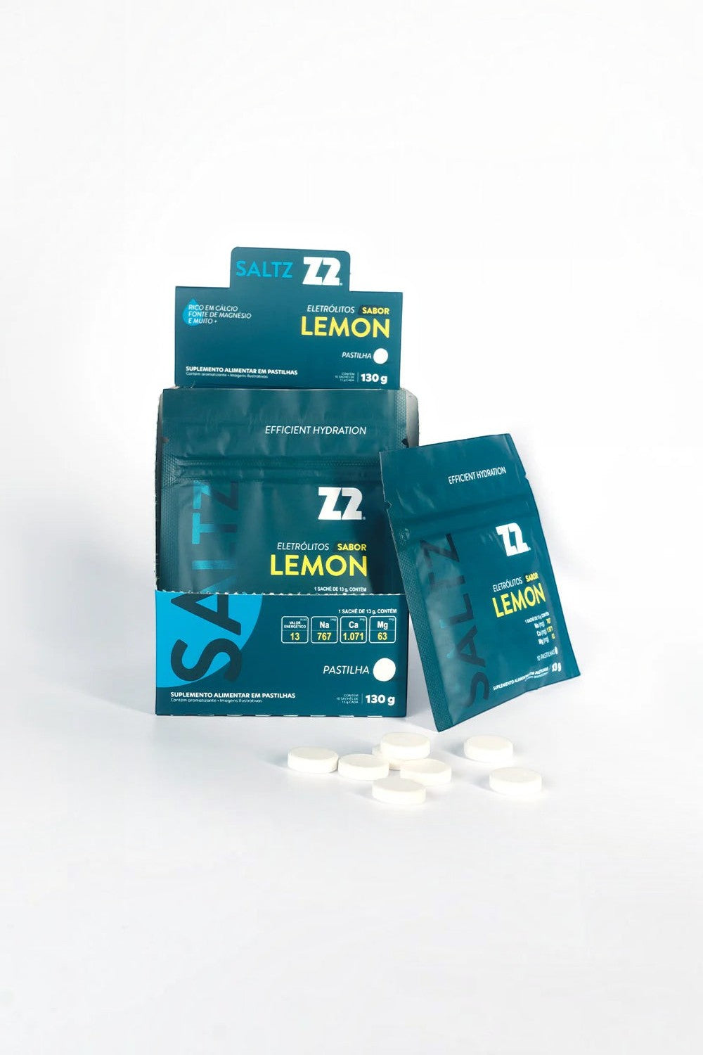 Caixa e sachês de eletrólitos mastigáveis SPORTBR Saltz Z2 sabor limão com pastilhas brancas sobre fundo branco