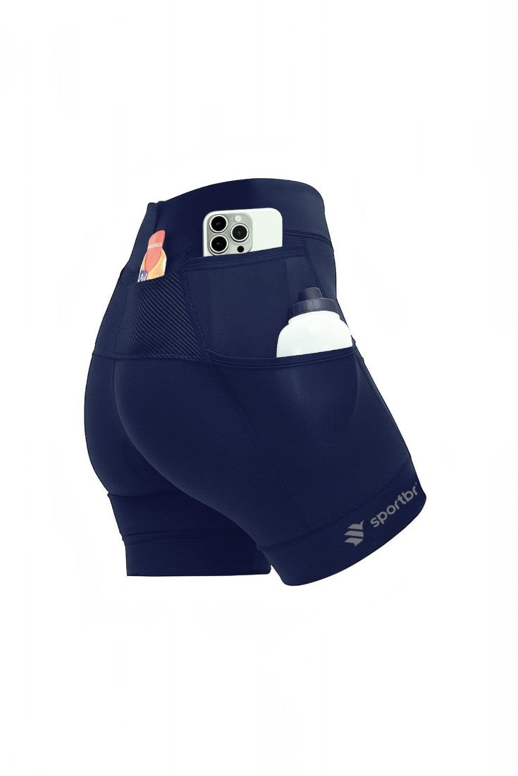 Shorts de compressão feminino azul marinho SPORTBR com 6 bolsos funcionais para celular e acessórios de corrida.