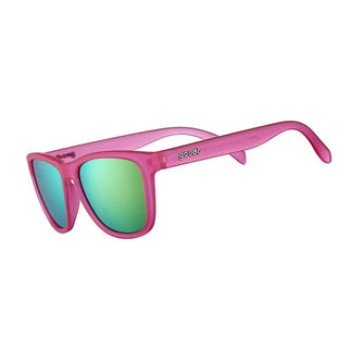 Óculos de sol rosa unissex com armação quadrada e lente azul espelhada, polarizada com proteção UV400. O acessório é leve, confortável e não escorrega ou pula no rosto ao realizar esportes.